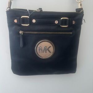 548A. Michael Kors Black and Gold Crossbody Bag